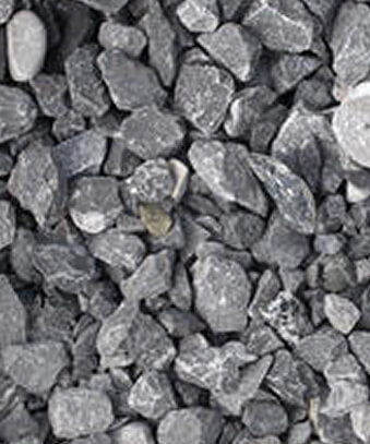 Top view of grey crushed gravel stones showing uniform angular construction aggregate material
